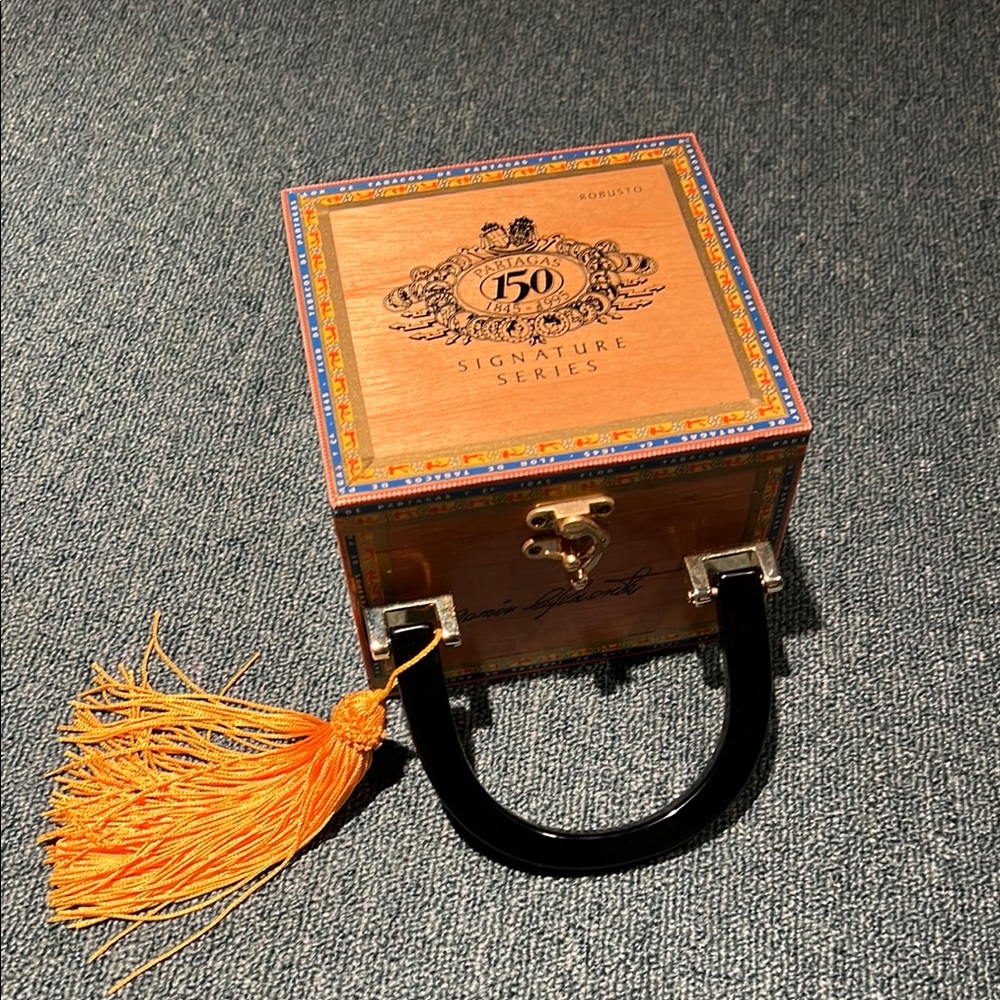 Signature Wooden Clutch with Black Handle and Orange Tassel